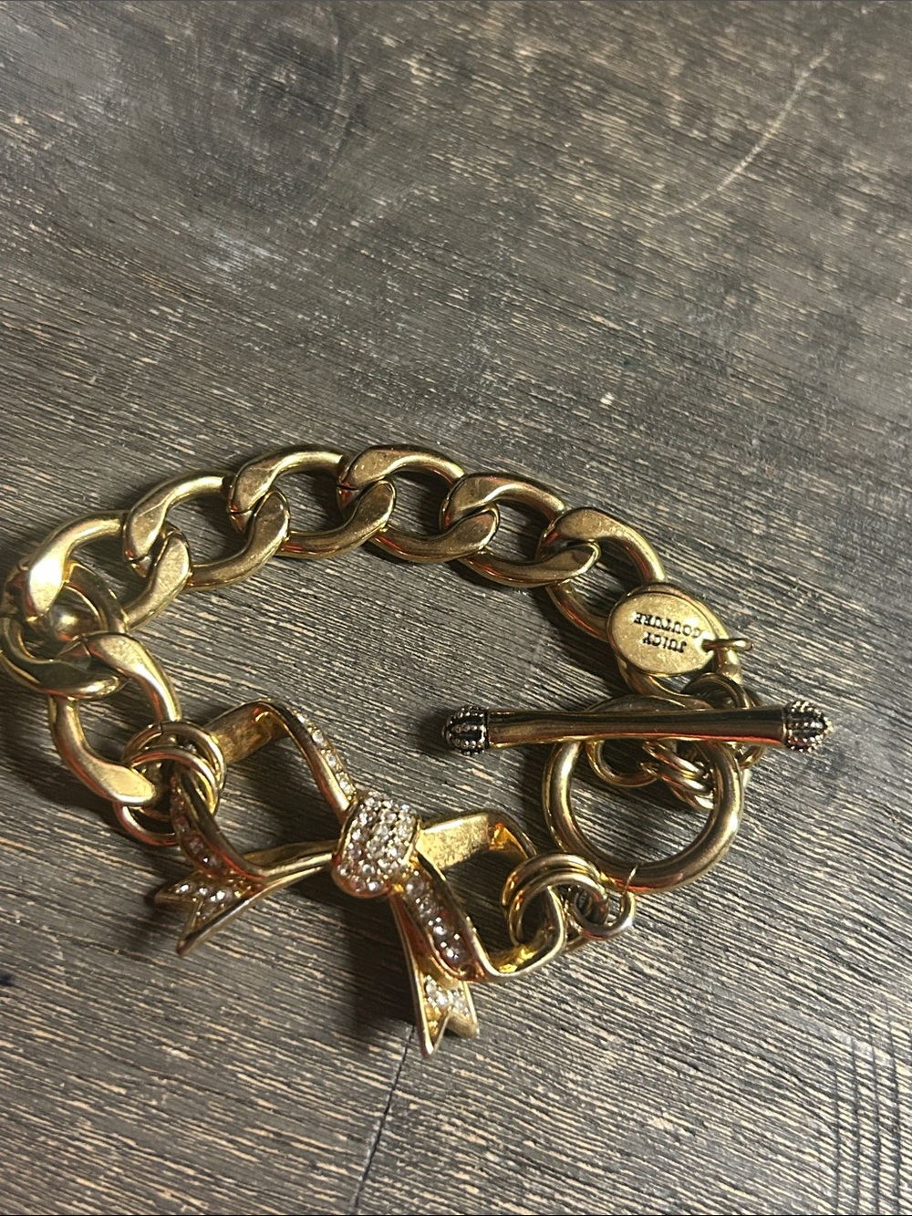 VGT Juicy Couture Gold Bow Toggle Charm Bracelet